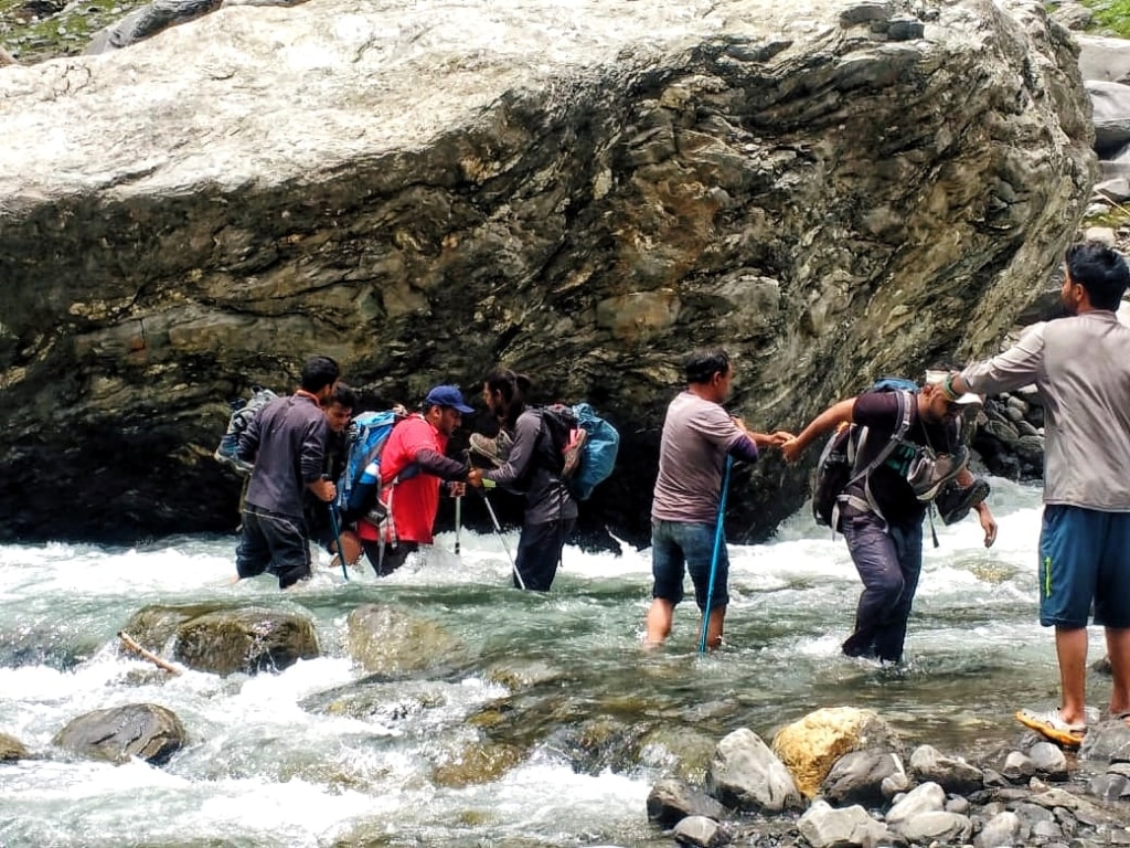 river crossing during hampta pass trek