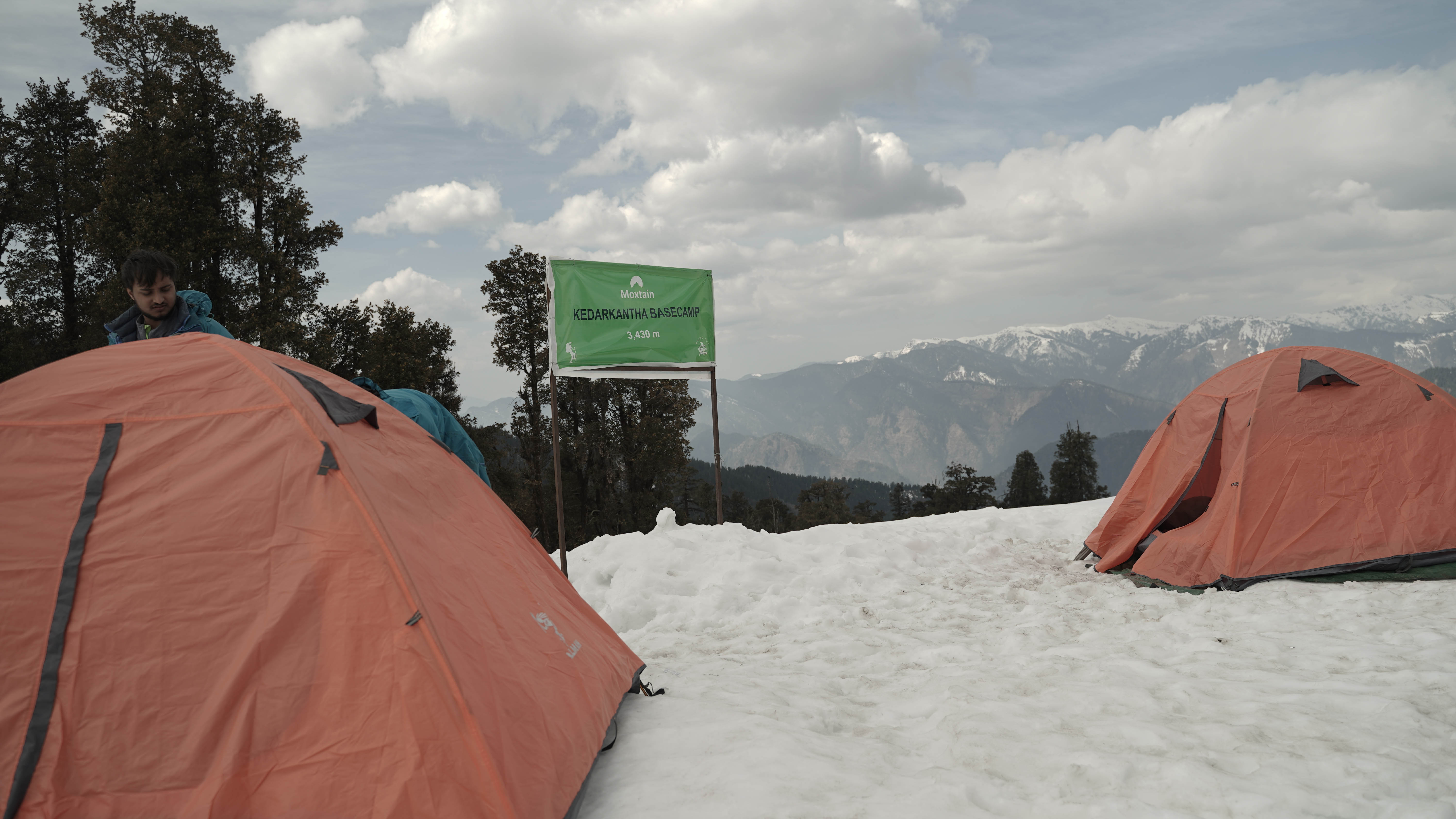 setting tents on snow on a levelled land