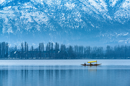 frozen dal lake with shikara